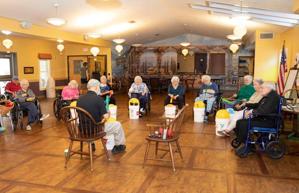 Residents at The Manor playing a group game