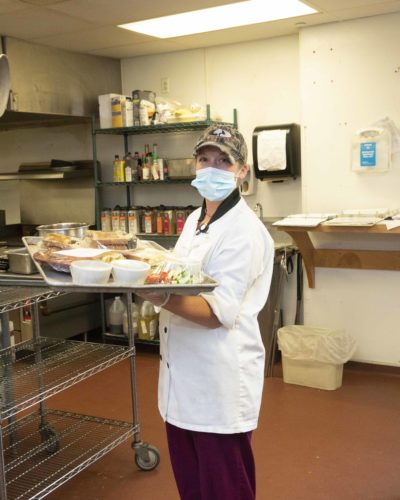 A member of the kitchen staff at The Manor